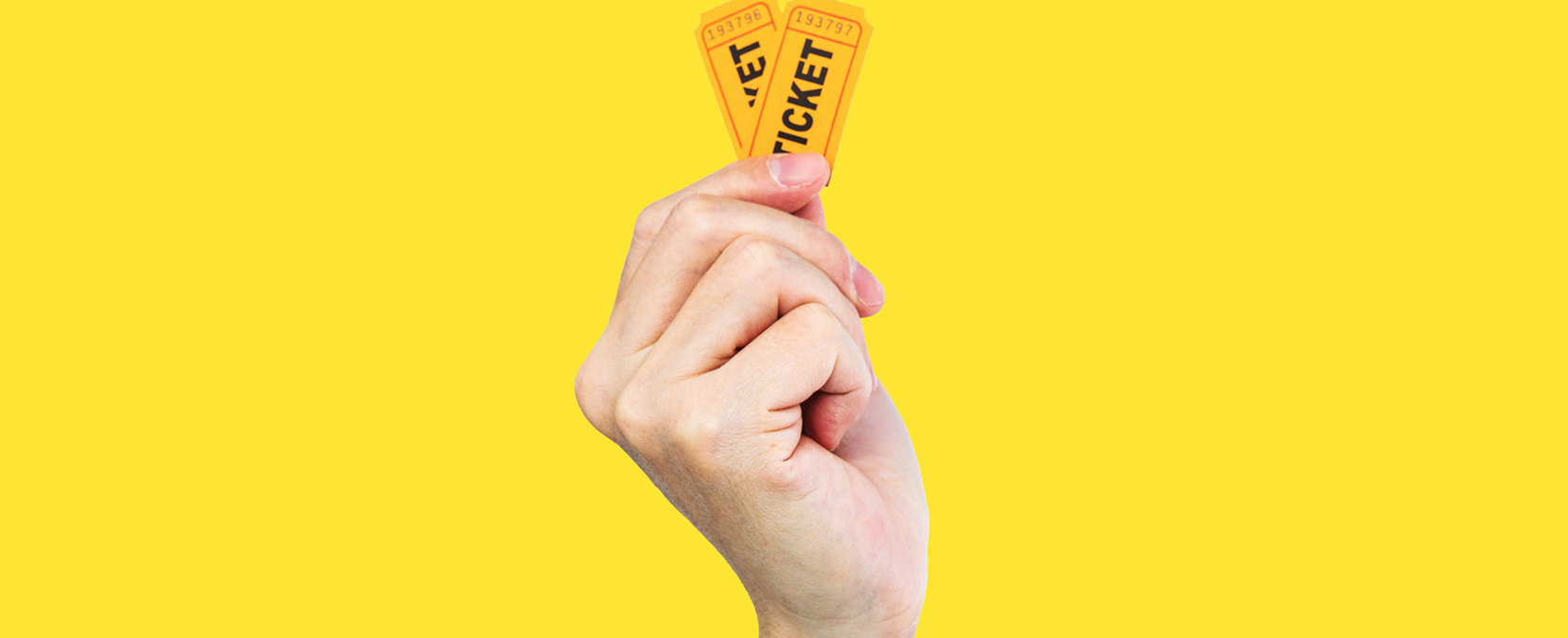 hand holding raffle tickets on a yellow bakcground